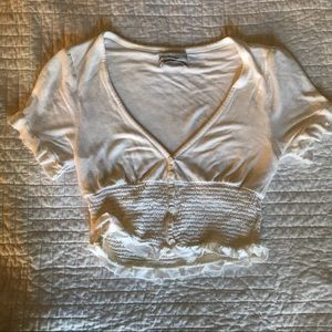 URBAN OUTFITTERS SMOCKED CROP TOP